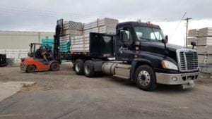 A United Pipe Truck Delivers PVC Pipe