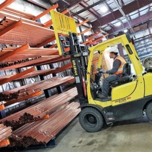 Forklift picks copper tube at United Pipe & Steel